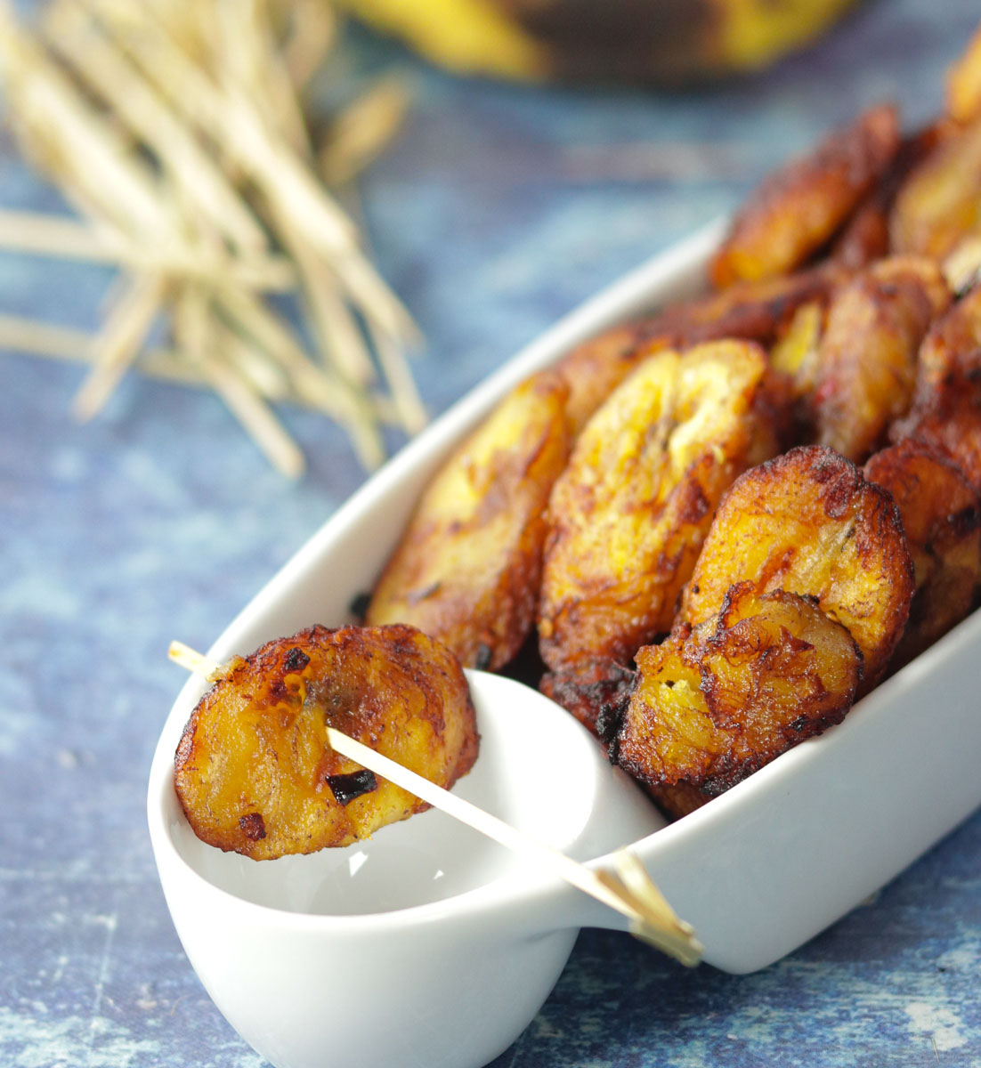 Fried Plantain in a platter with toothpics