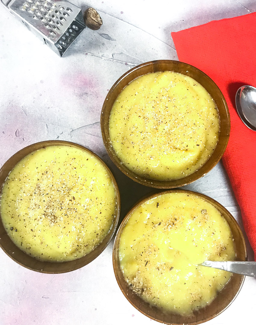 Majarete - Dominican Corn Pudding in 3 bowls with nutmeg