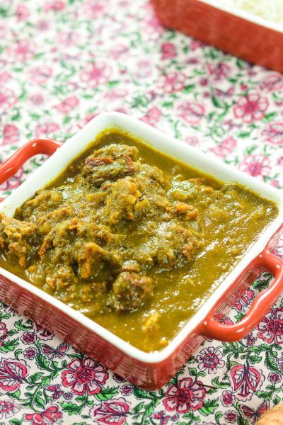 Palak Mangodi in a square red bowl