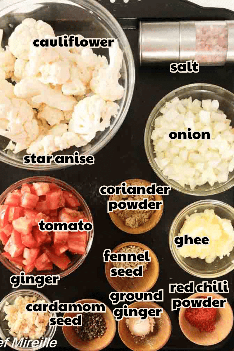 ingredients with labels for making Kashmiri Cauliflower Masala