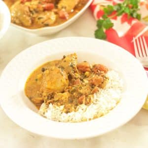 plate of coconut curry chicken with rice