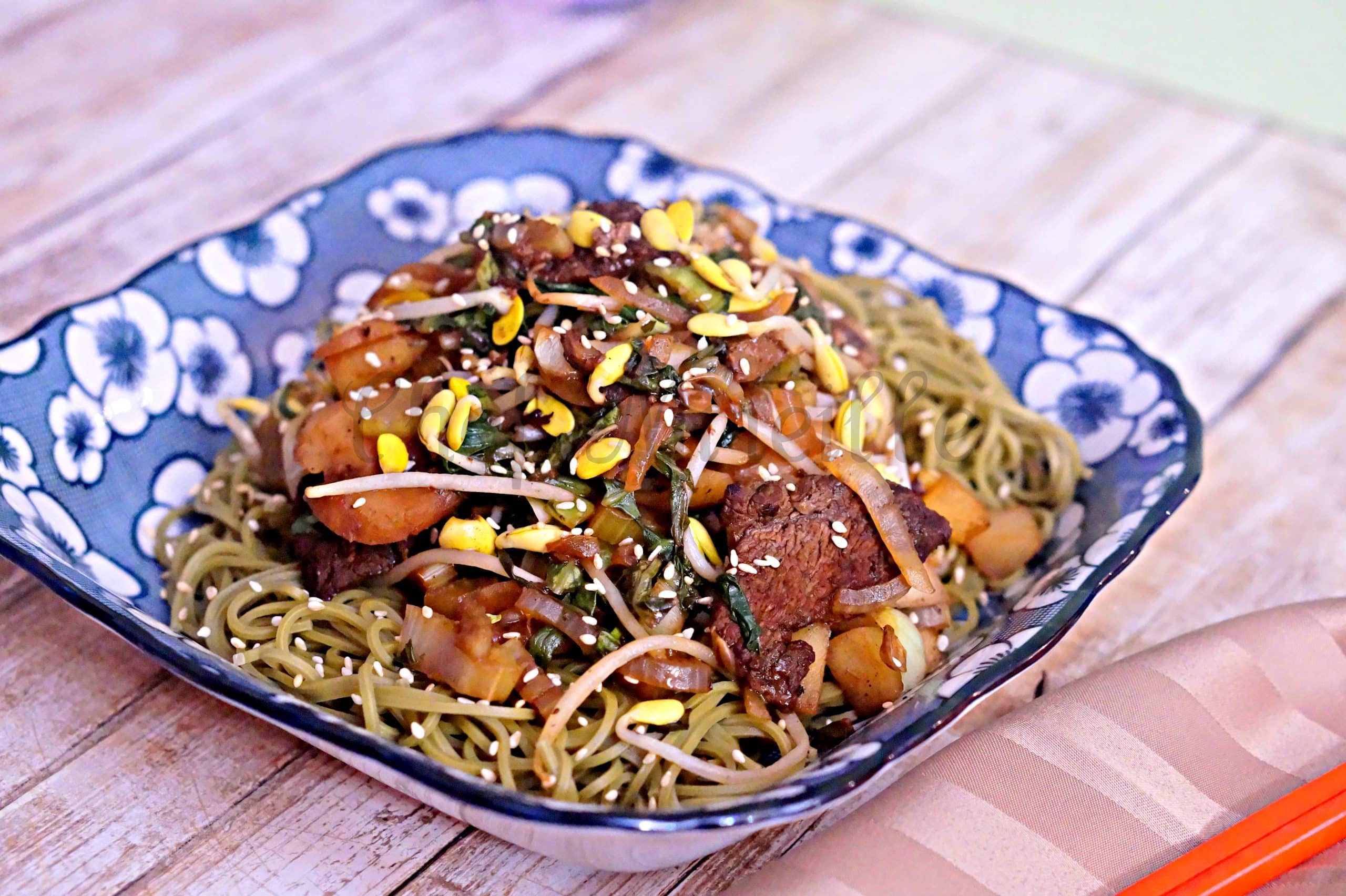 Stir Fried Duck with Bean Sprouts served over noodles