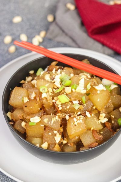 Bowl of Thai Winter Melon Stir-Fry with chopsticks