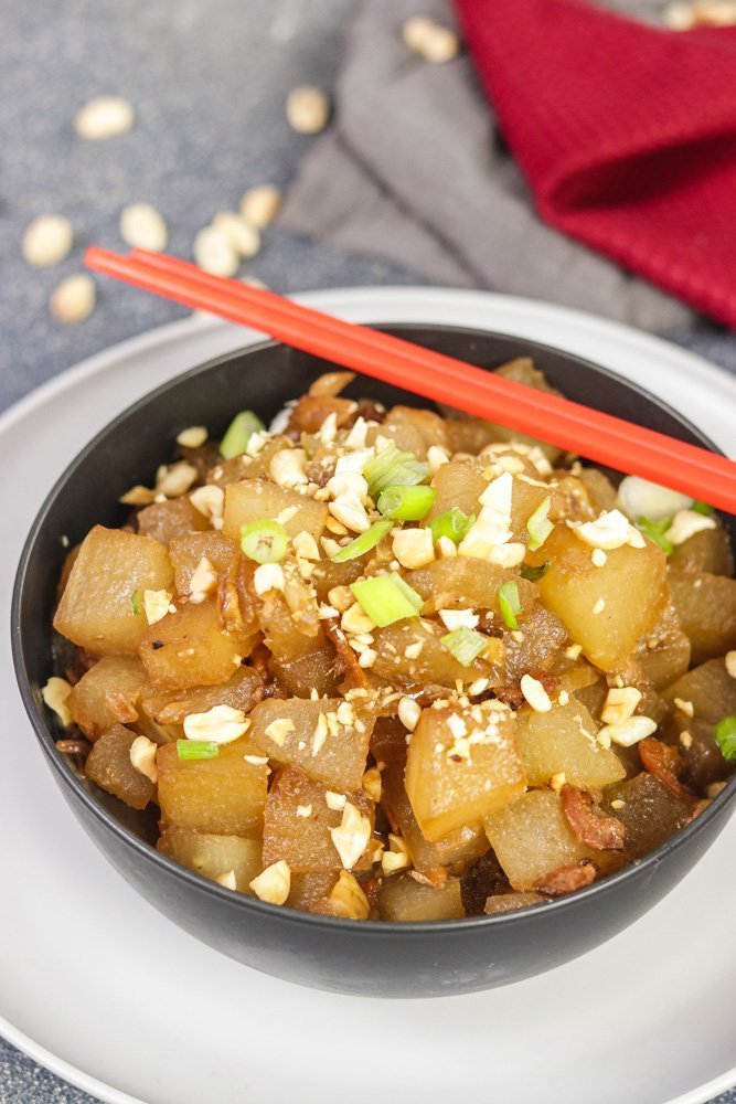 Bowl of Thai Winter Melon Stir-Fry with chopsticks