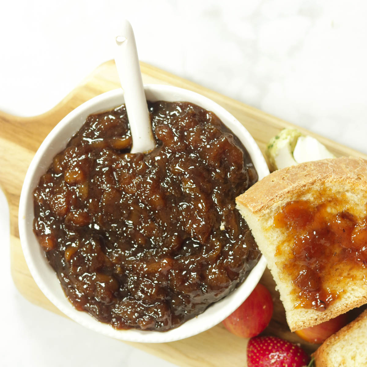 bowl of jam with bread