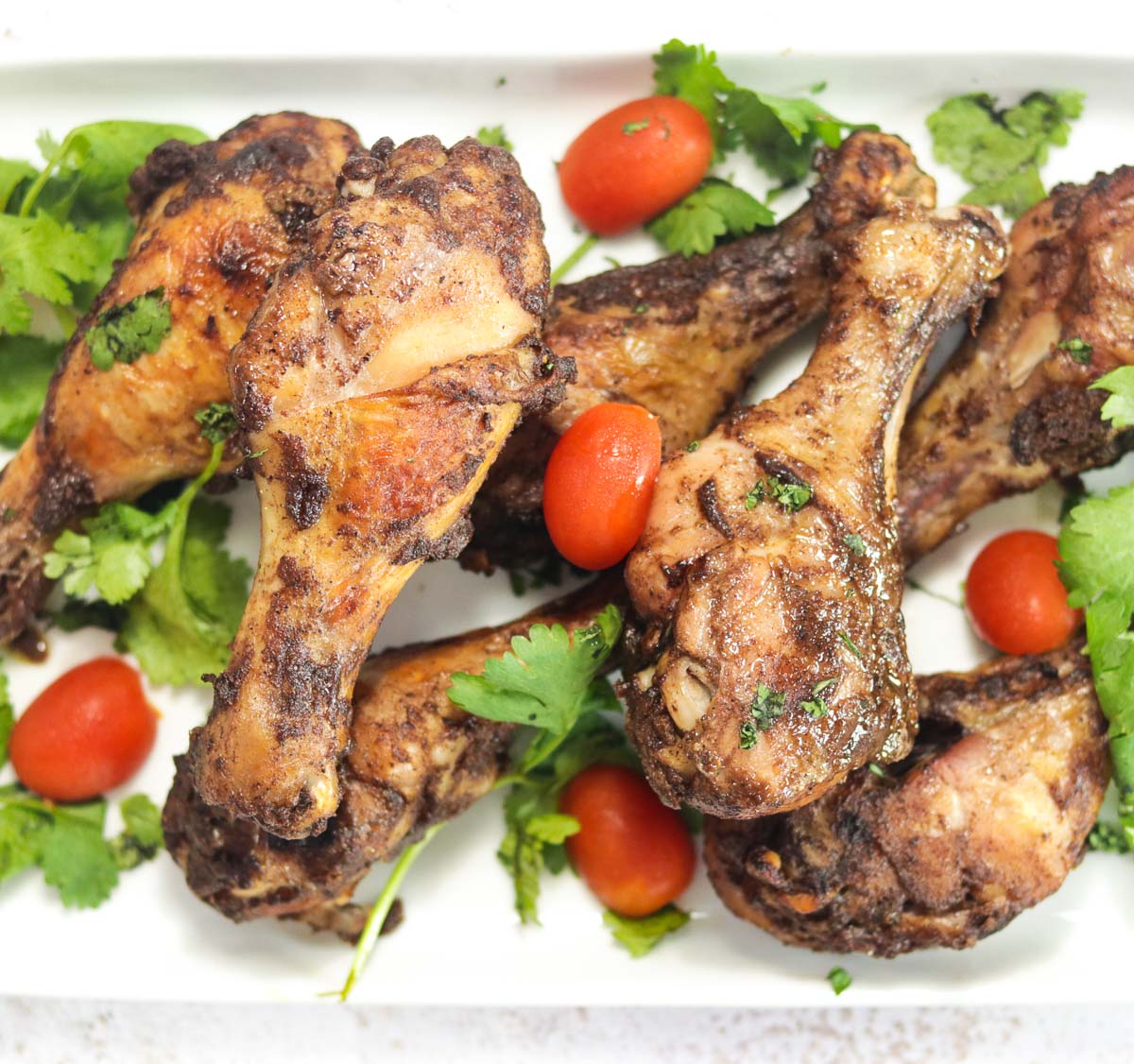 plate of chicken drumsticks