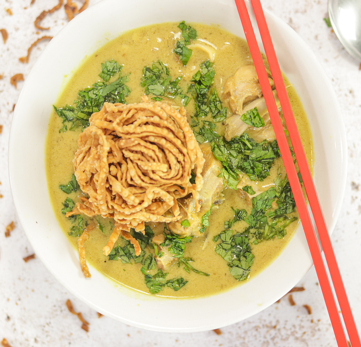 bowl of soup with chopsticks