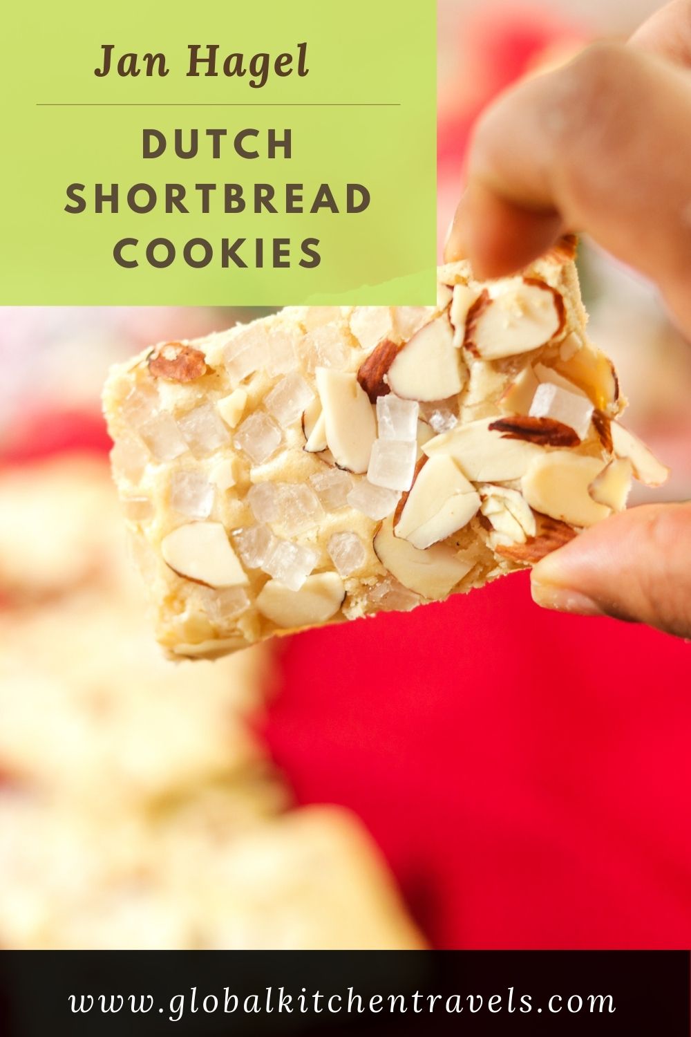 fingers holding cookie with text