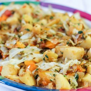cabbage and potato side dish on a plate