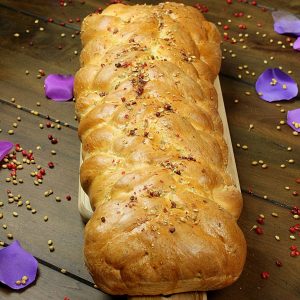 spiced French bread on a wooden table