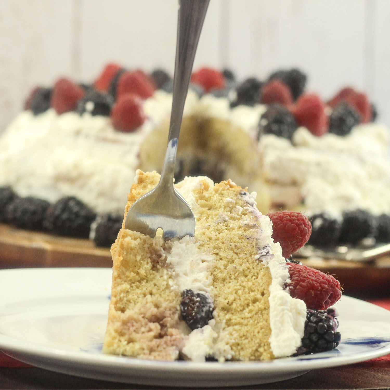 Layered Cream Cake with Fresh Berries.