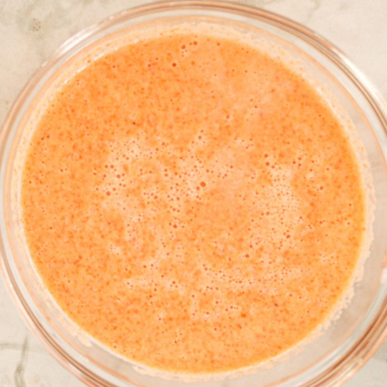 carrot and plantain puree in a bowl for Haitian Labouyi