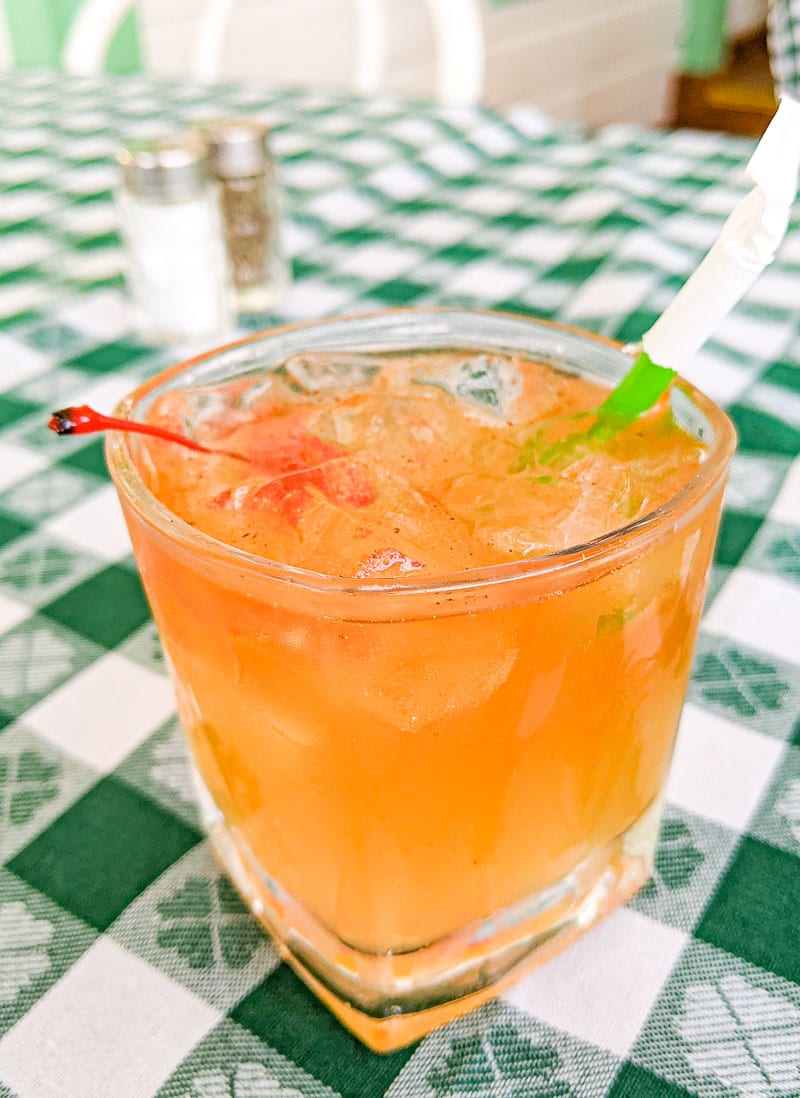 Old Fashioned Rum Punch in a glass on table at Hemingway's Restaurant Antigua