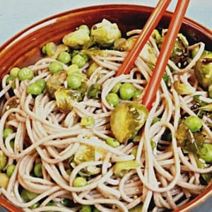 Soba Noodle Salad with Brussel Sprouts in a bowl with chopsticks
