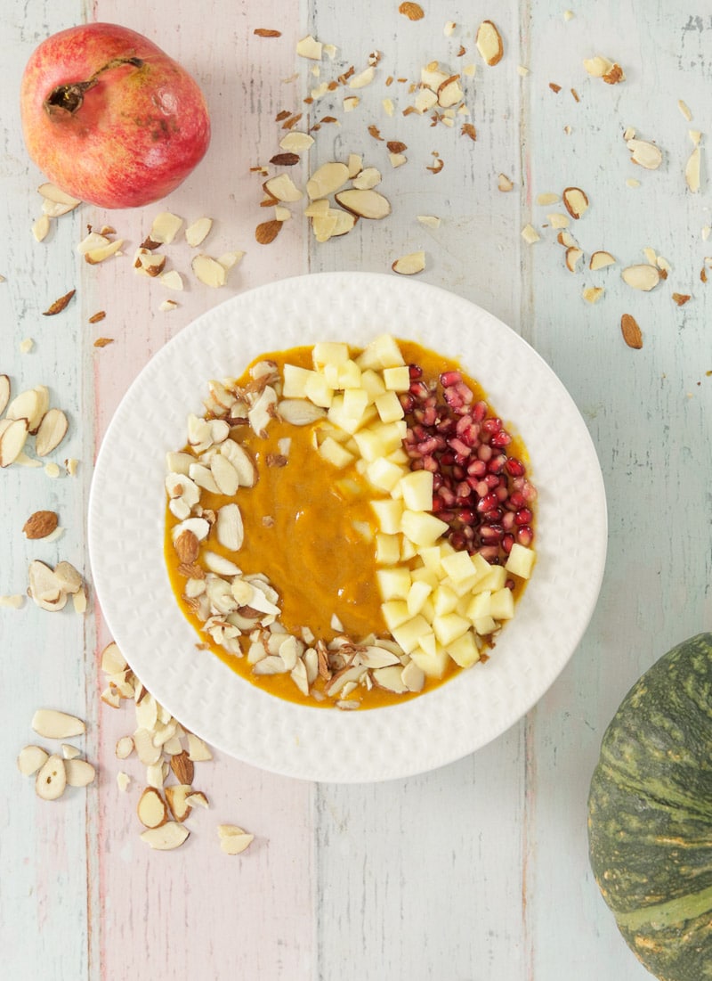 Pumpkin Smoothie Bowl with almonds, apples and pomegranate