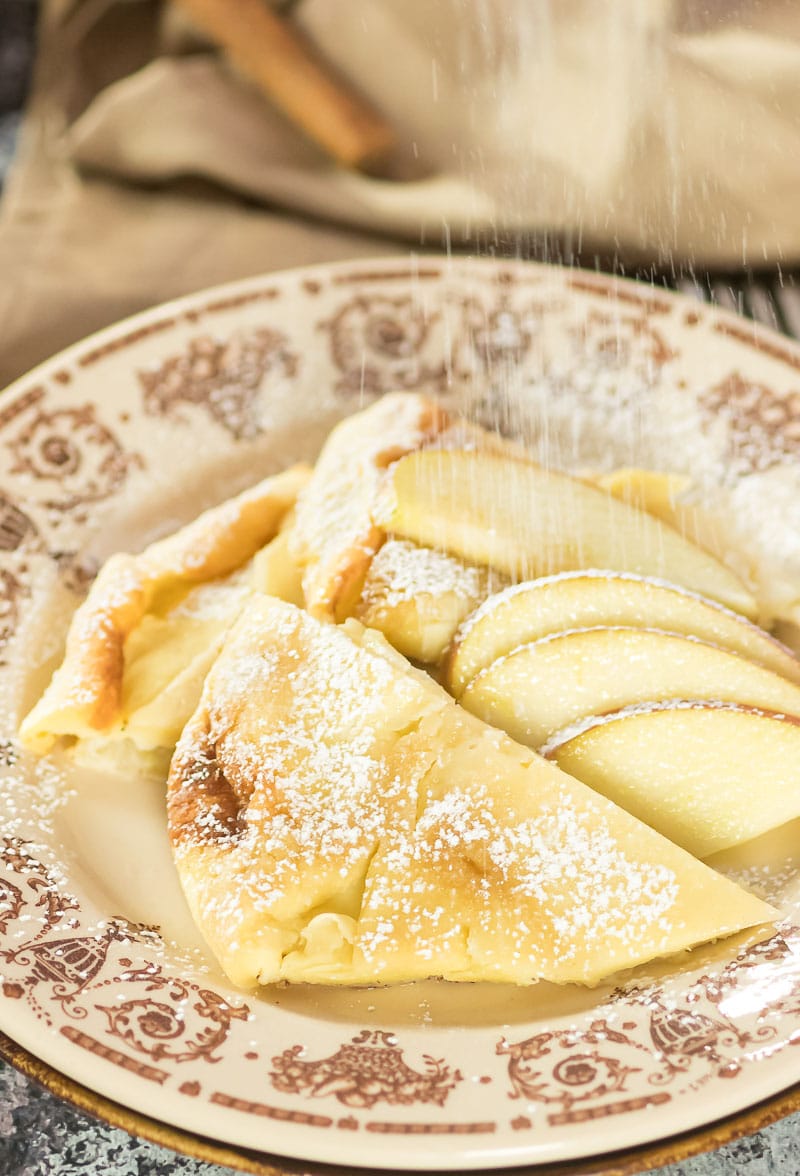 Apple Oven Pancake with powdered sugar.