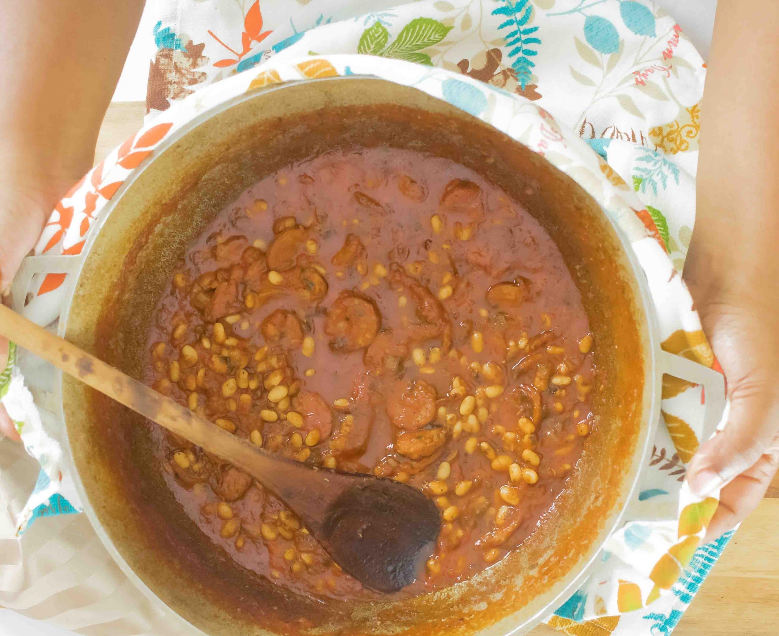 white bean stew with chorizo in a pot
