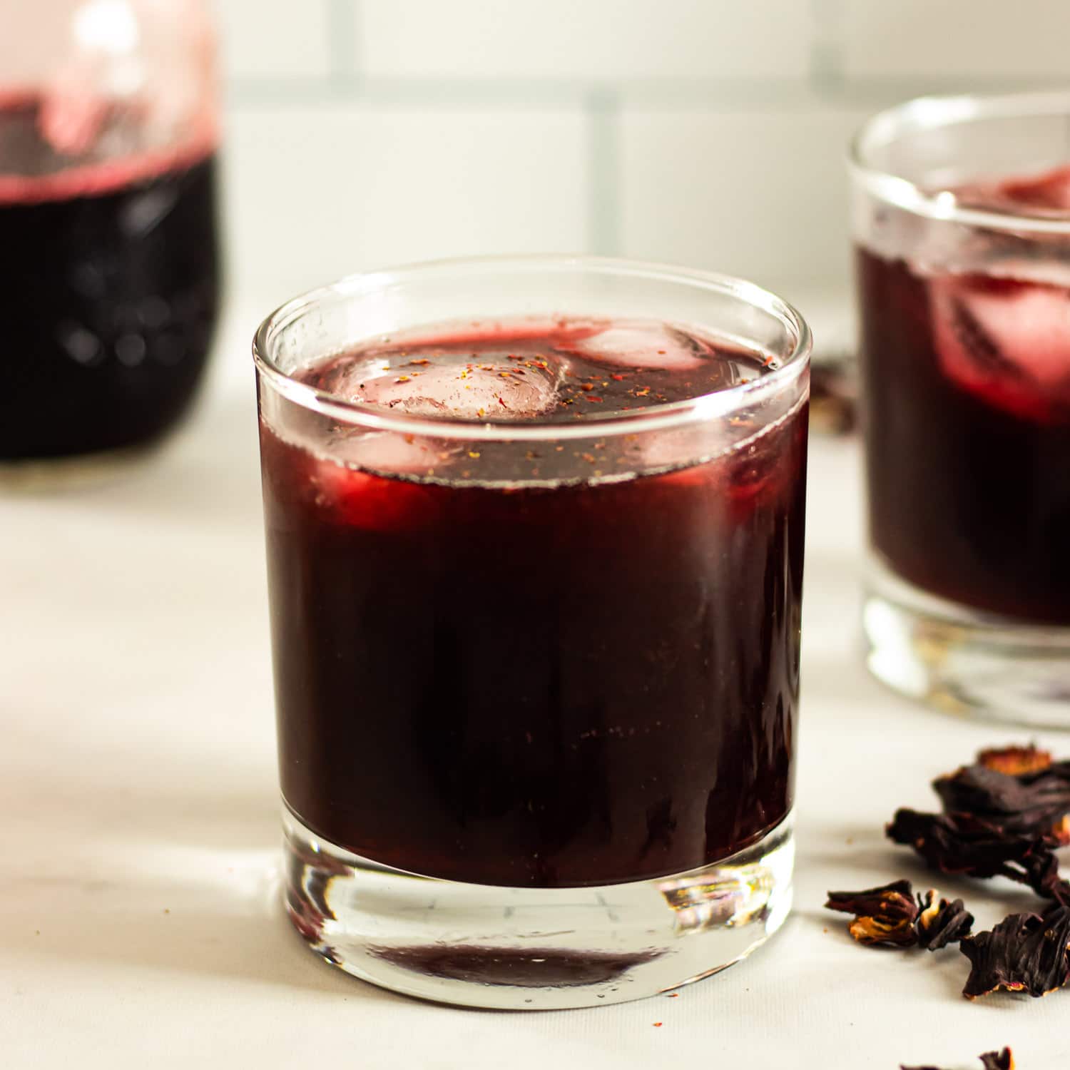 Hibiscus Rum Punch with dried hibiscus flowers 