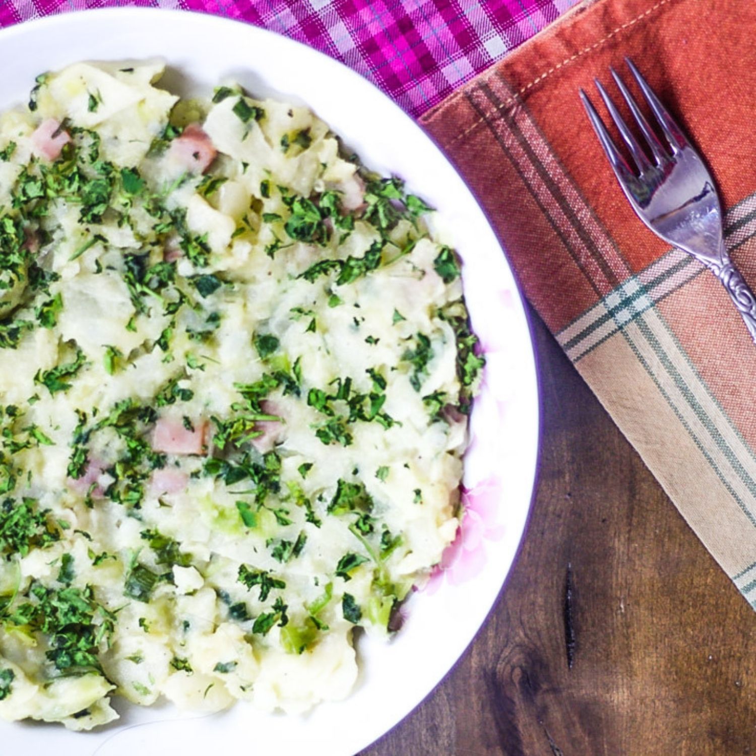 Irish Colcannon Recipe in a bowl with a fork on the side