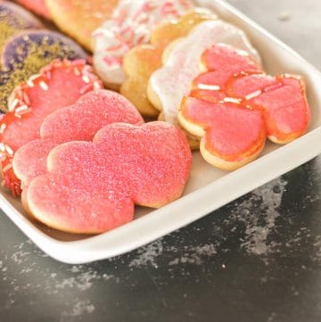 pint heart shaped cookies on a white tray