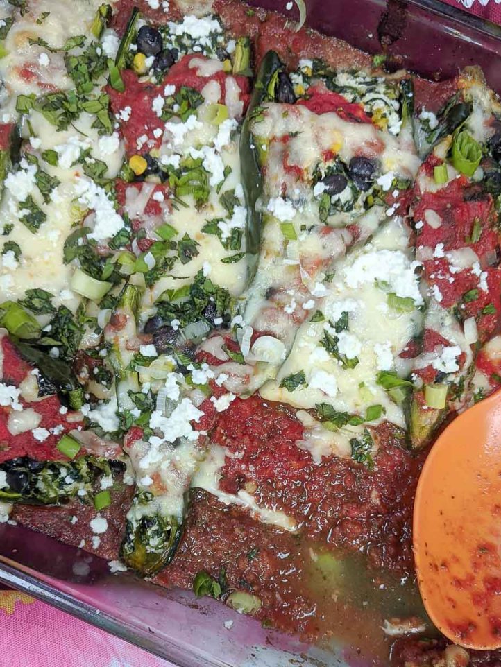 platter of Stuffed Poblano Casserole with serving spoon