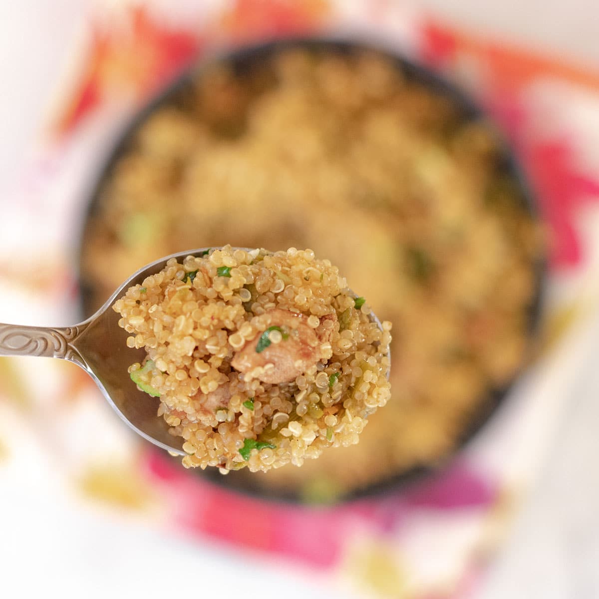 quinoa with ham on a spoon