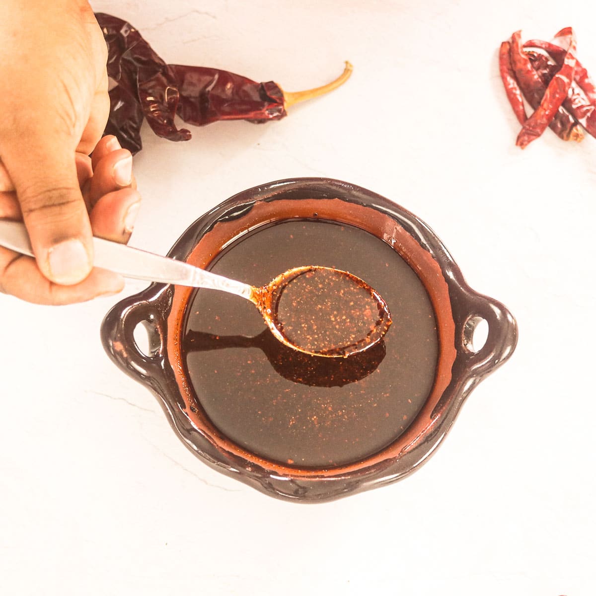 bowl of Salsa Macha with a spoon