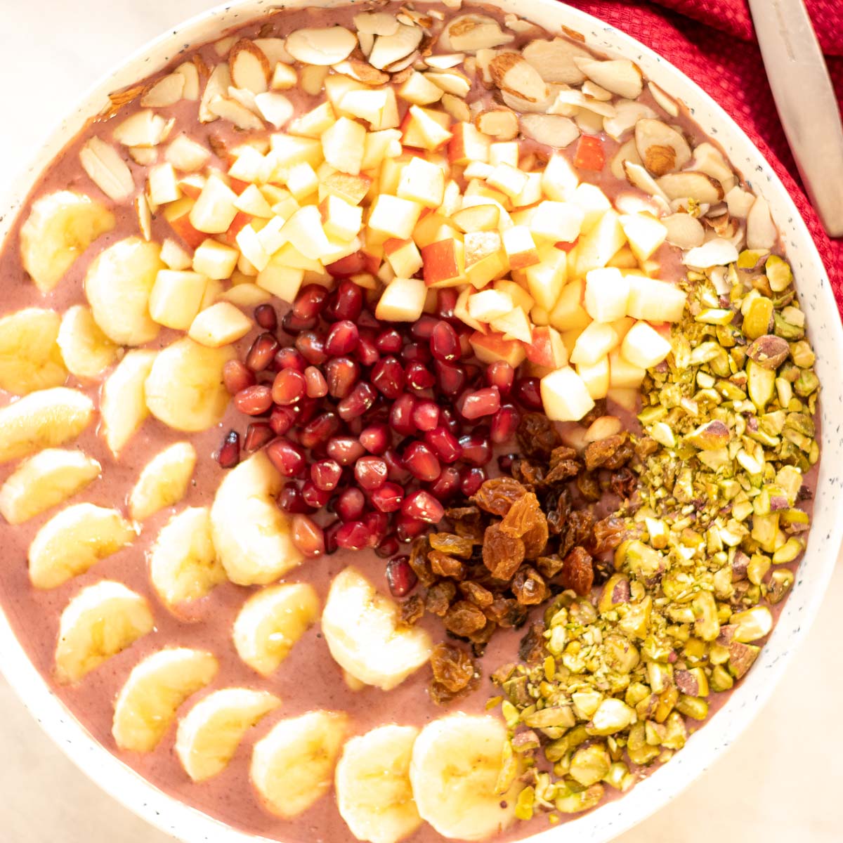 Acai Smoothie Bowl topped with nuts and fruit