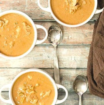 African Peanut Soup in bowls with spoons