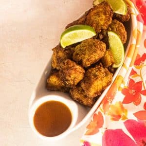 Fried Shark with Lime Wedges and Hot sauce (recipe post)