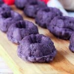 Ube Puto layed out on a wooden board